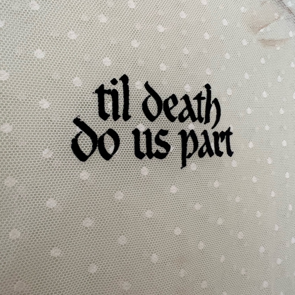 Polka Dot Mesh Fabric with Gothic Text